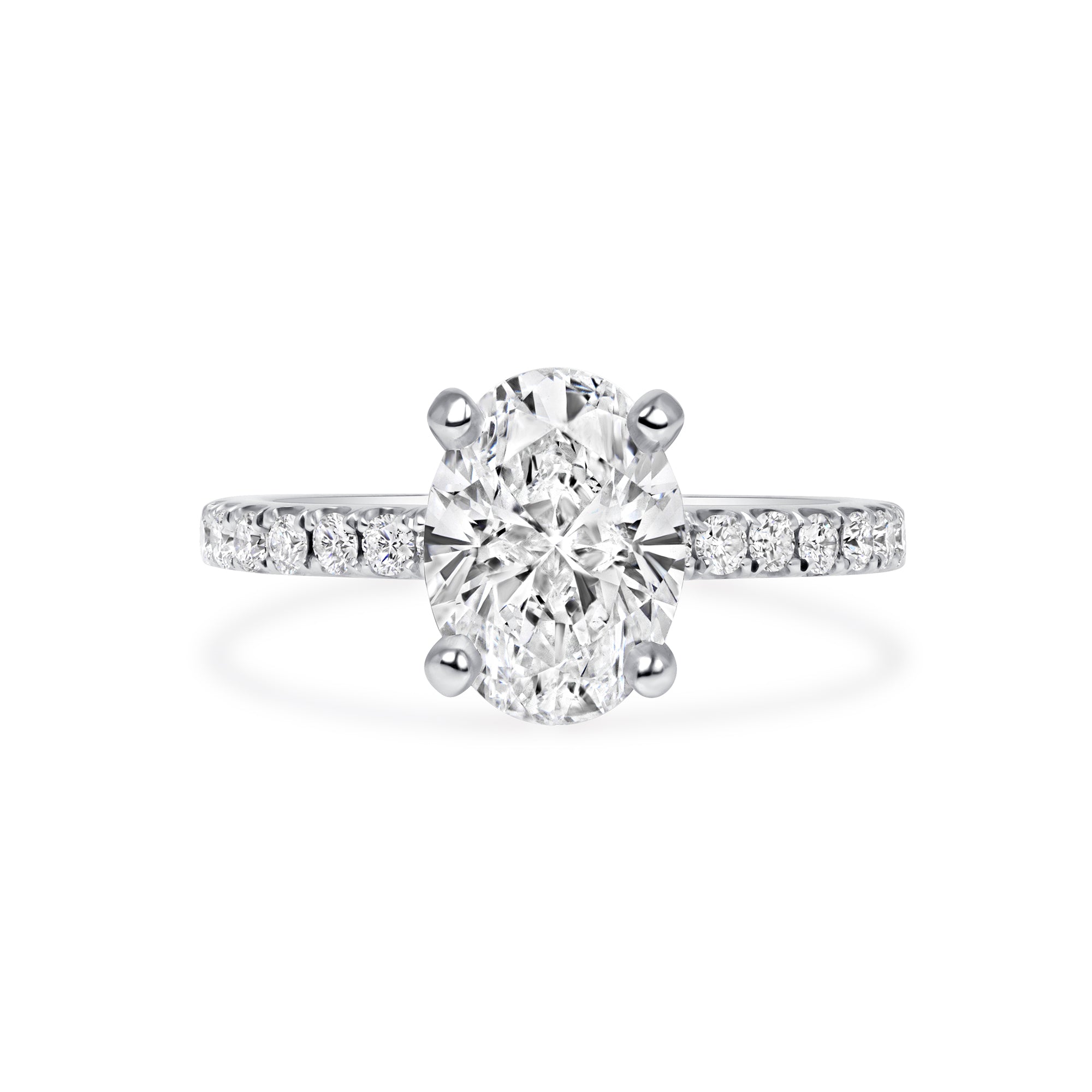 Oval Cut Diamond Ring with Pavé Band in Platinum