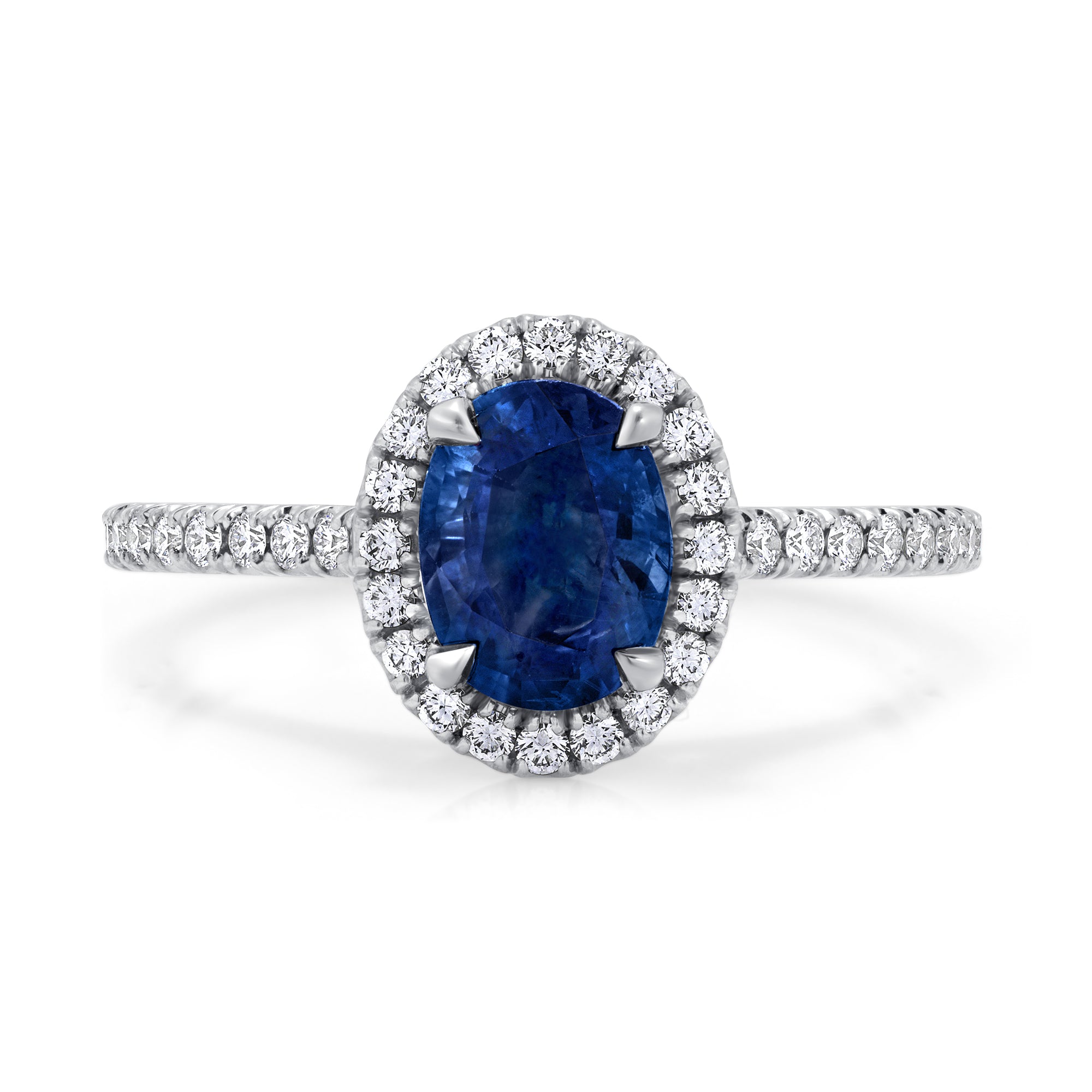 Oval Blue Sapphire and Diamond Halo Ring with Pavé Band in Platinum