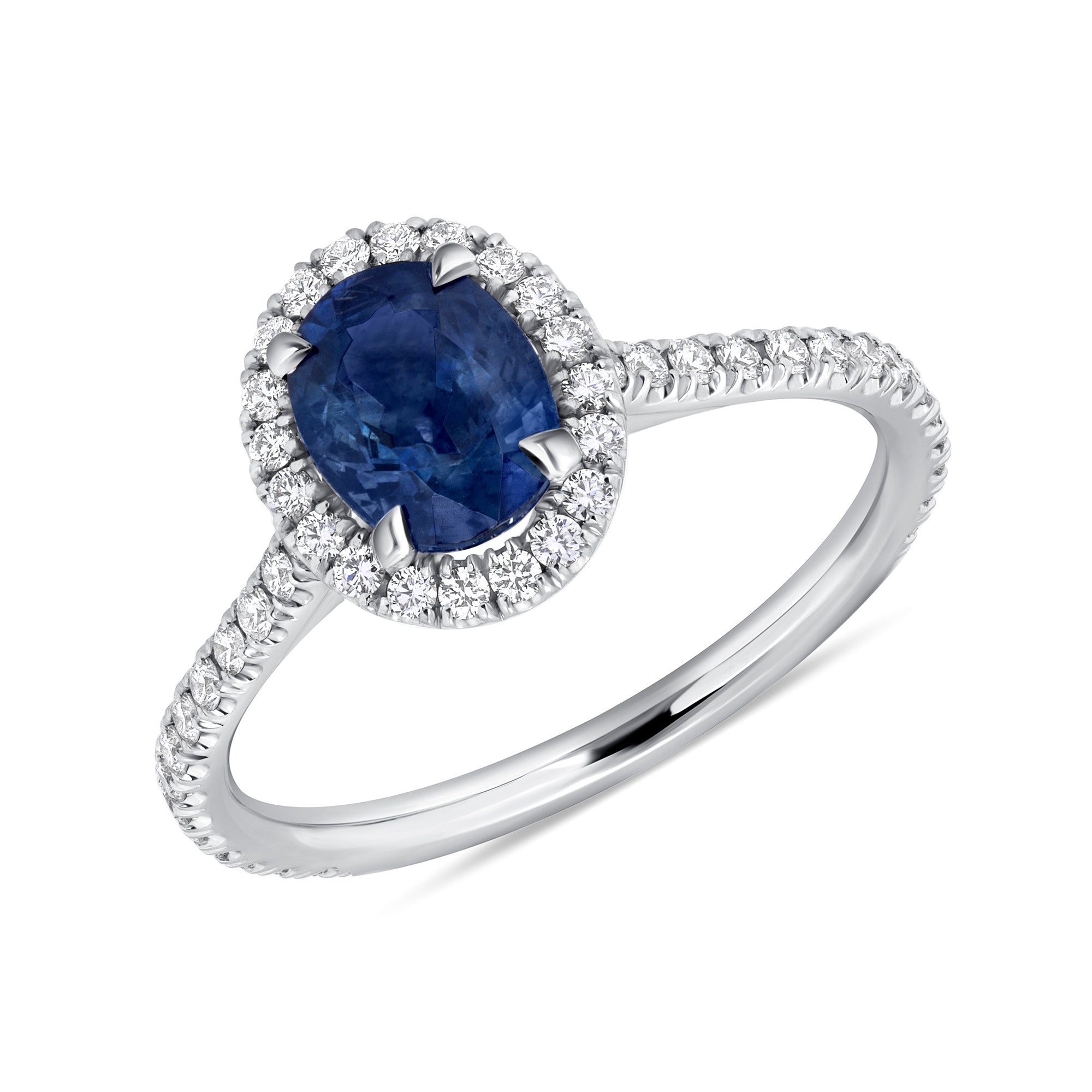 Oval Blue Sapphire and Diamond Halo Ring with Pavé Band in Platinum