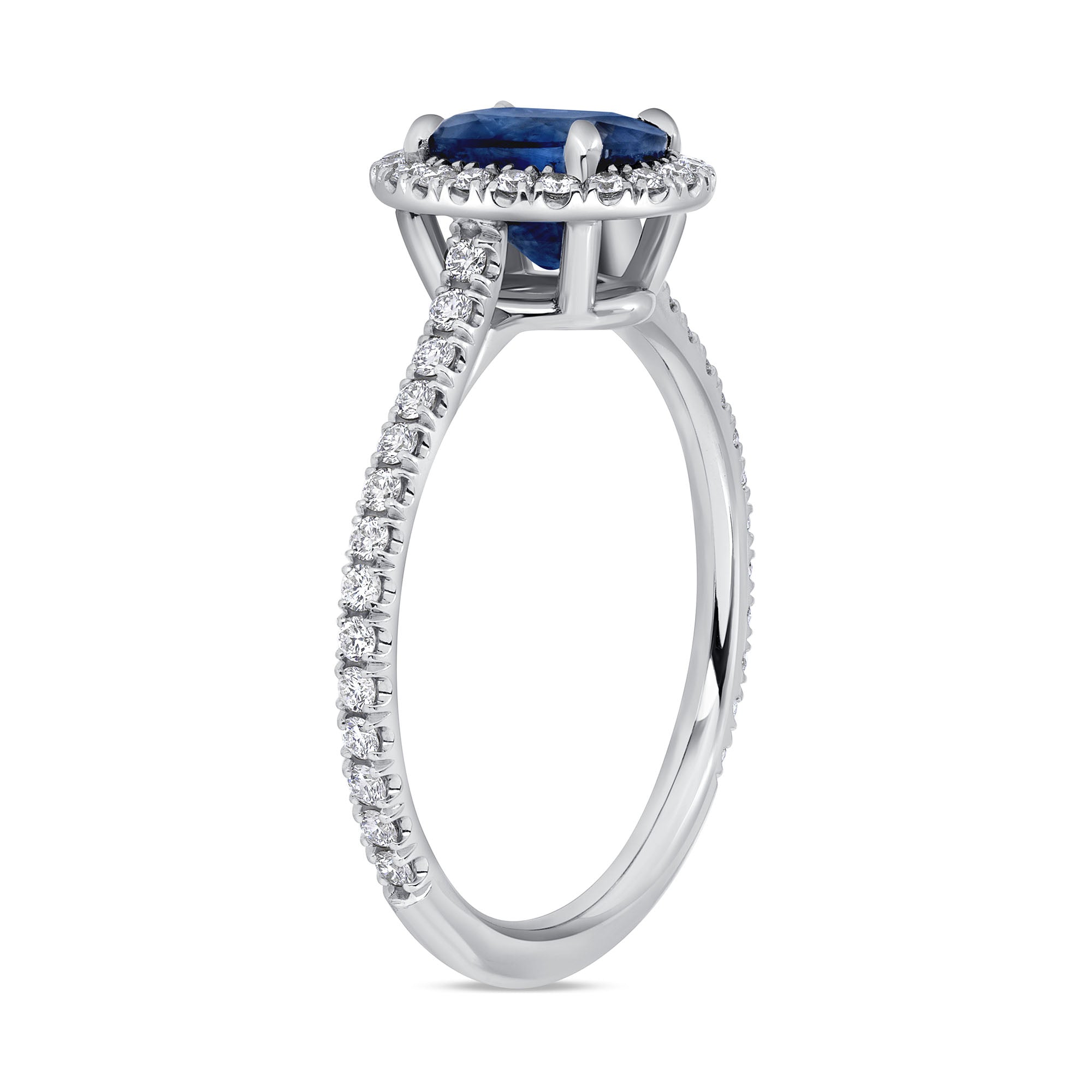 Oval Blue Sapphire and Diamond Halo Ring with Pavé Band in Platinum
