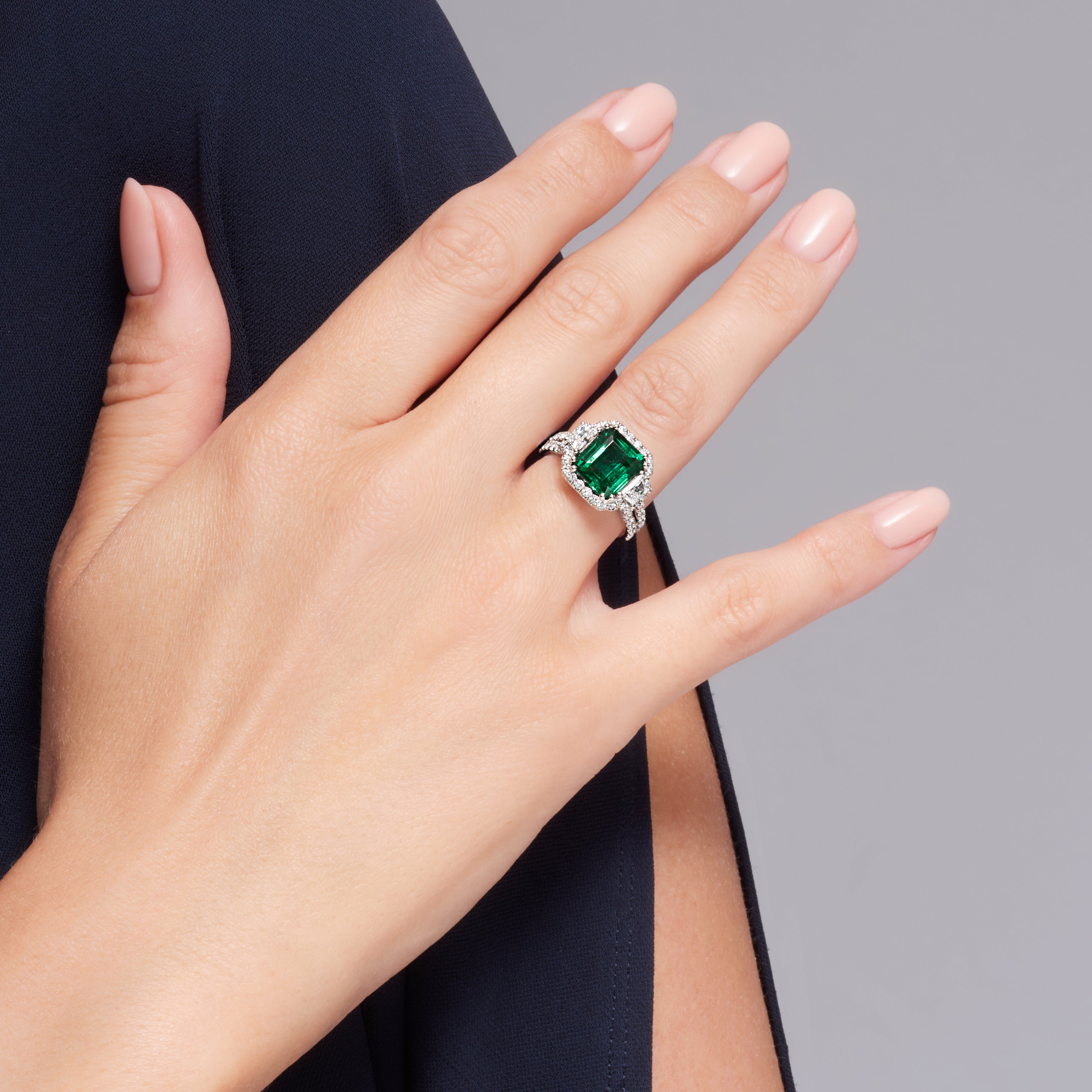 Emerald Cut Green Emerald Diamond Halo Ring In Platinum
