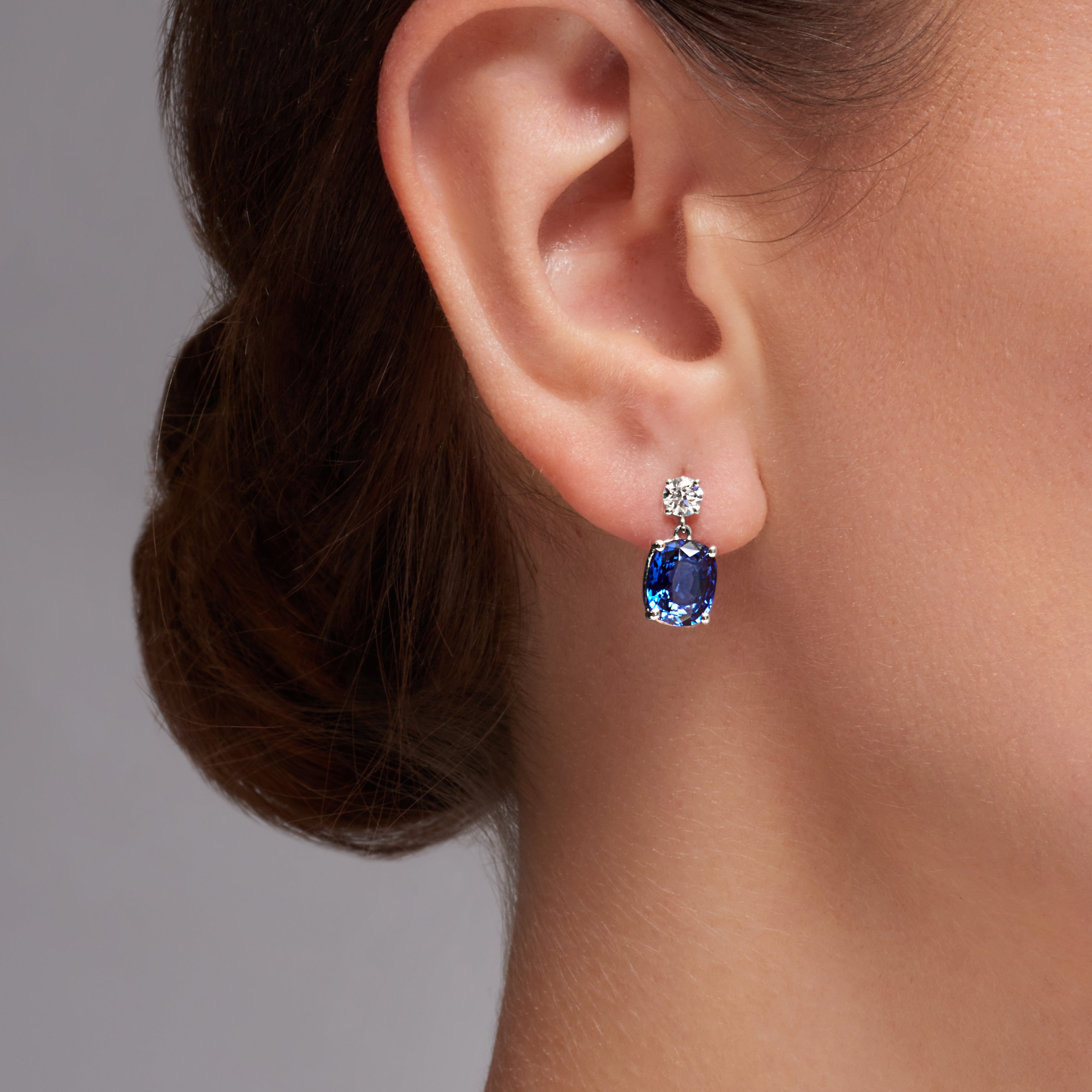 Blue Sapphire And Diamond Dangling Earrings In 18 Karat White Gold