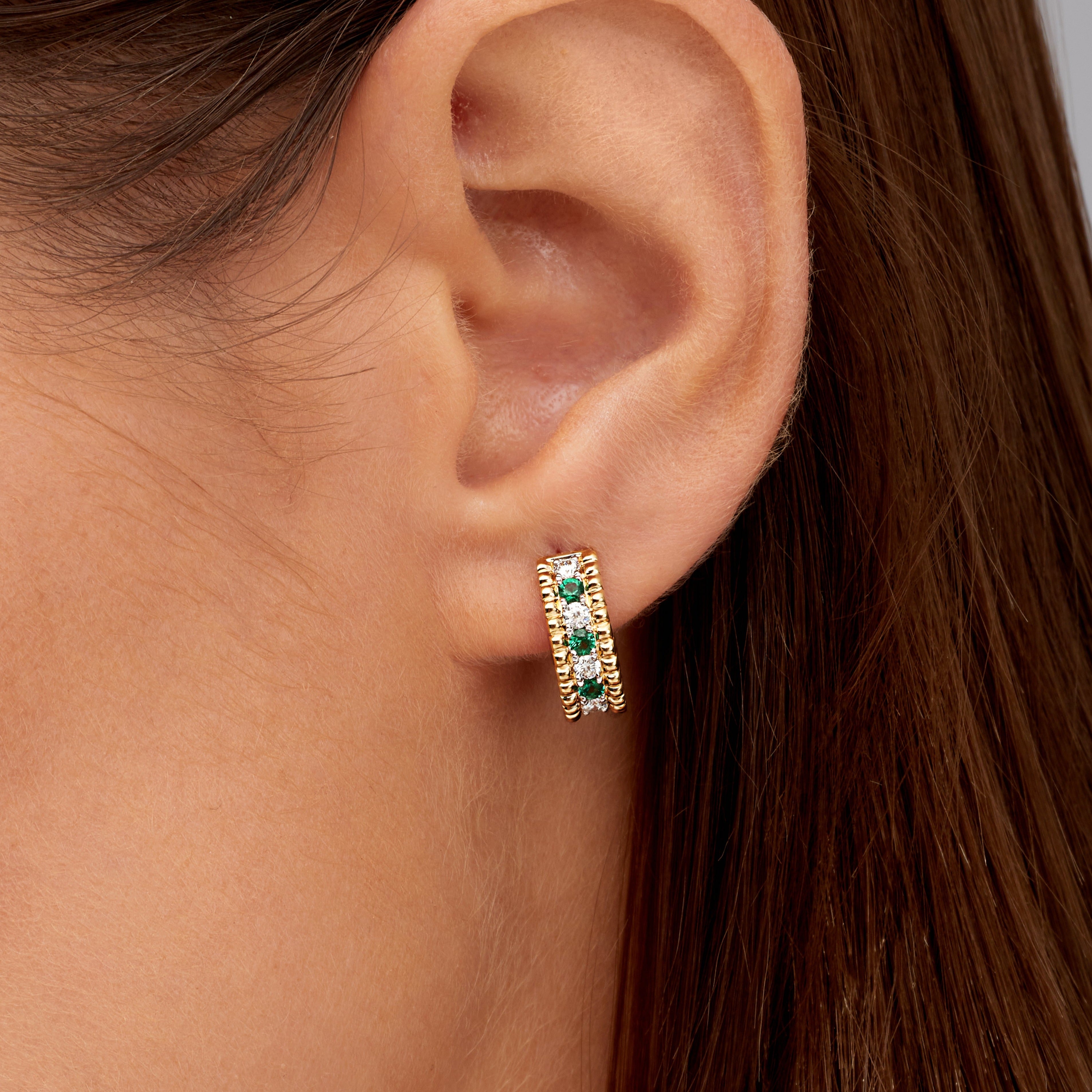 Alternating Diamond and Emerald Huggie Earrings in 18K Yellow Gold
