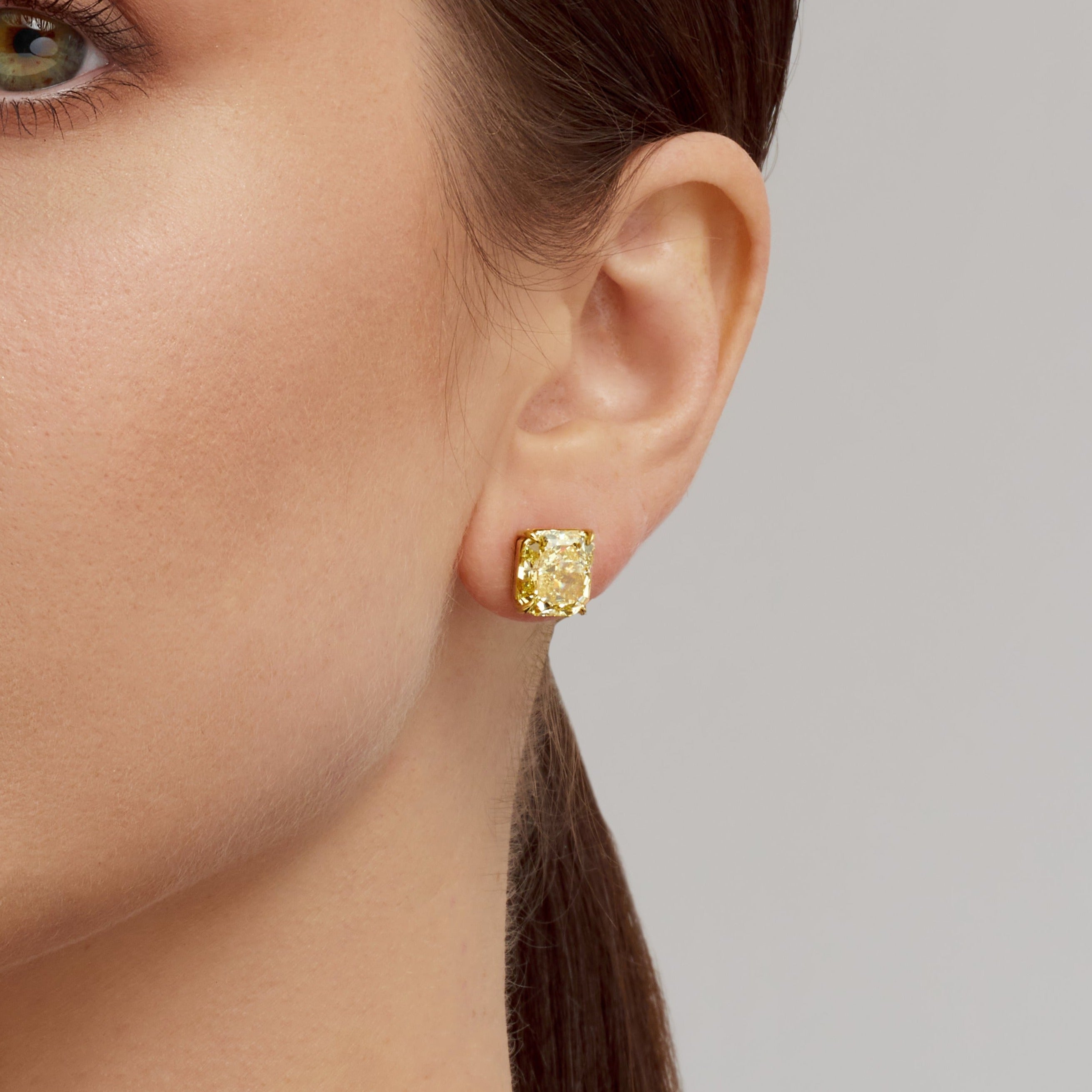 Radiant Cut Fancy Yellow Diamond Stud Earrings in 18 Karat Yellow Gold