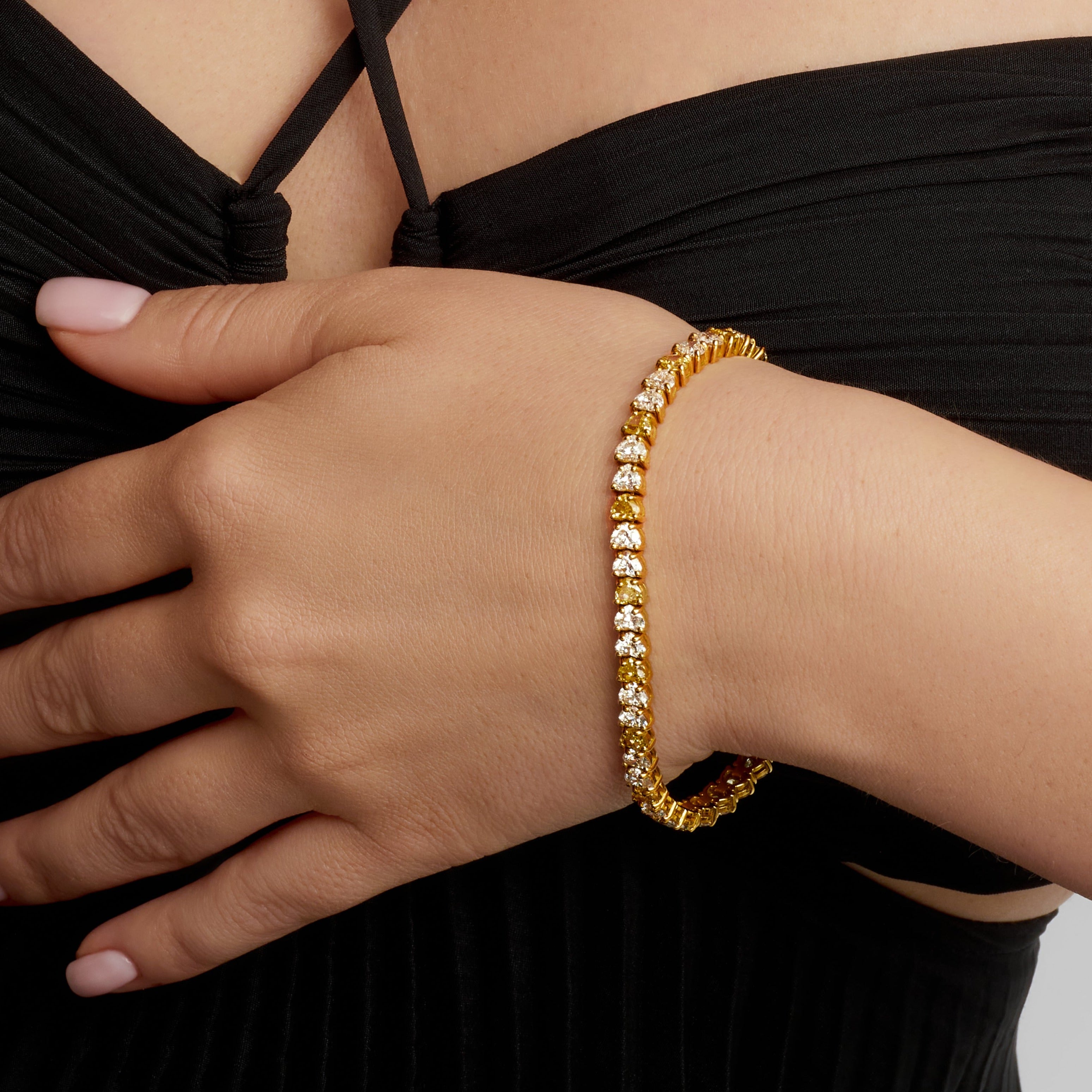 Heart Shape Alternating Fancy Yellow and White Diamond Tennis Bracelet in 18 Karat Yellow Gold