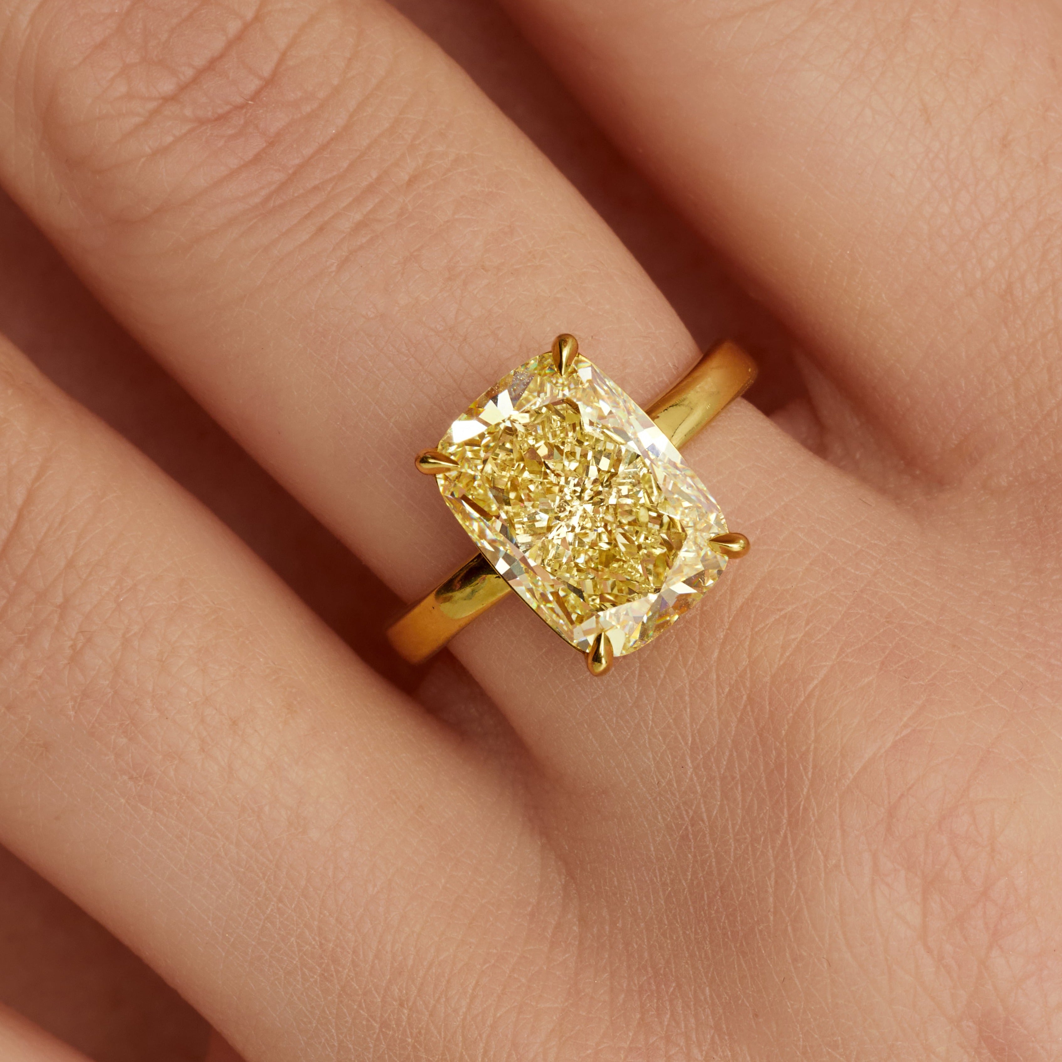 Cushion Cut Fancy Light Yellow Diamond Solitaire Ring in 18 Karat Yellow Gold