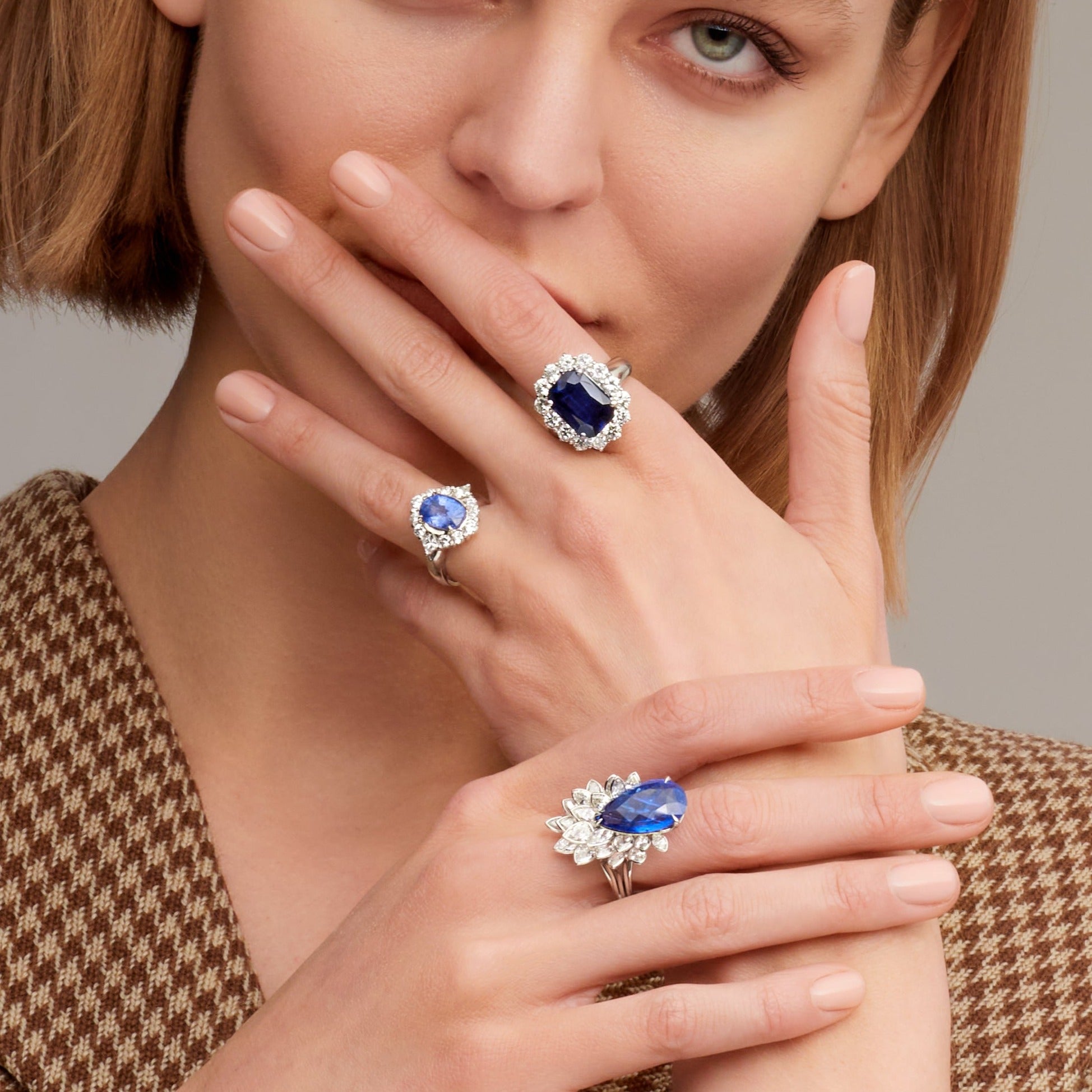 Radiant Cut Sapphire Ring with Round Cut Diamond Halo in Platinum Ruthenium