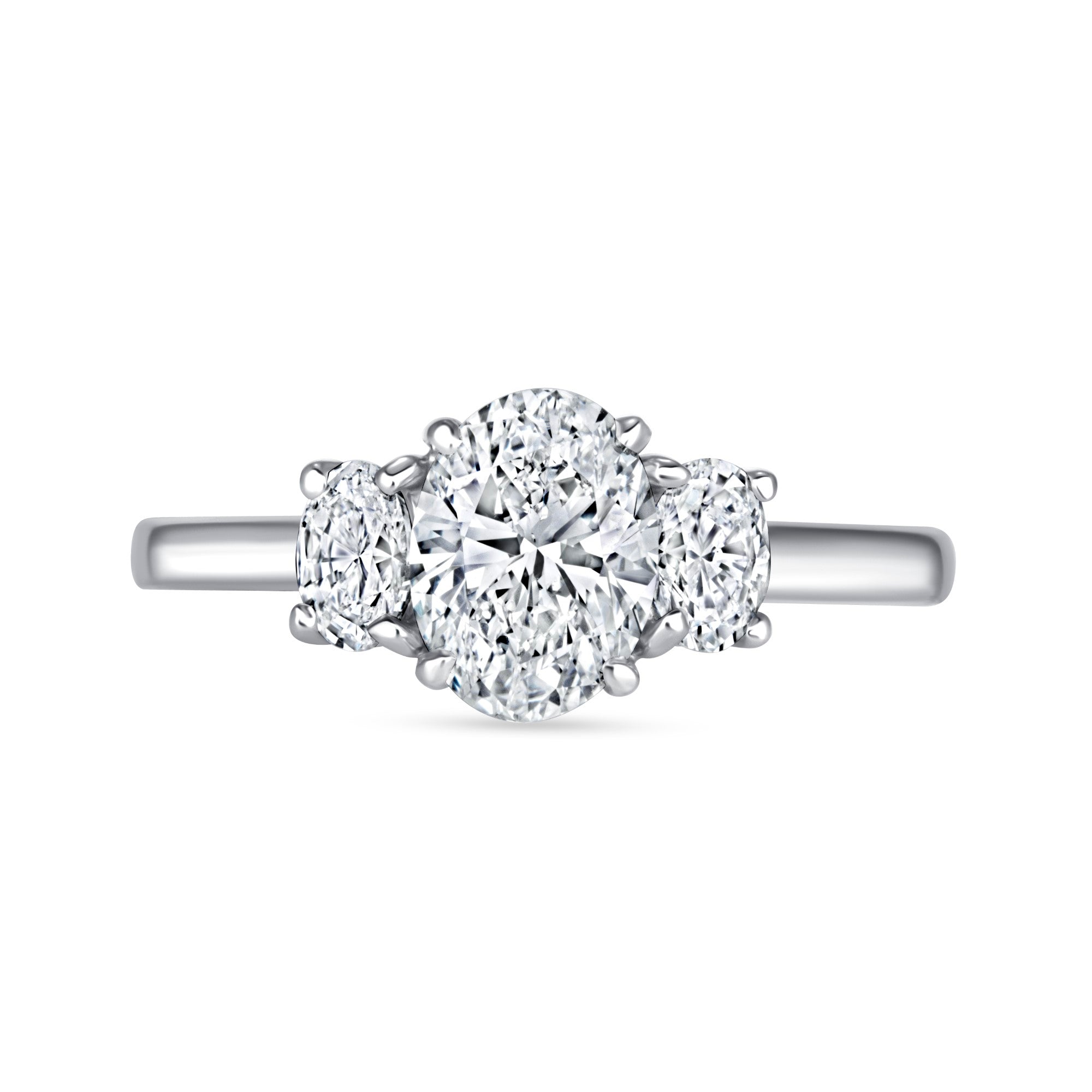 Oval Cut Diamond Three Stone Engagement Ring in Platinum