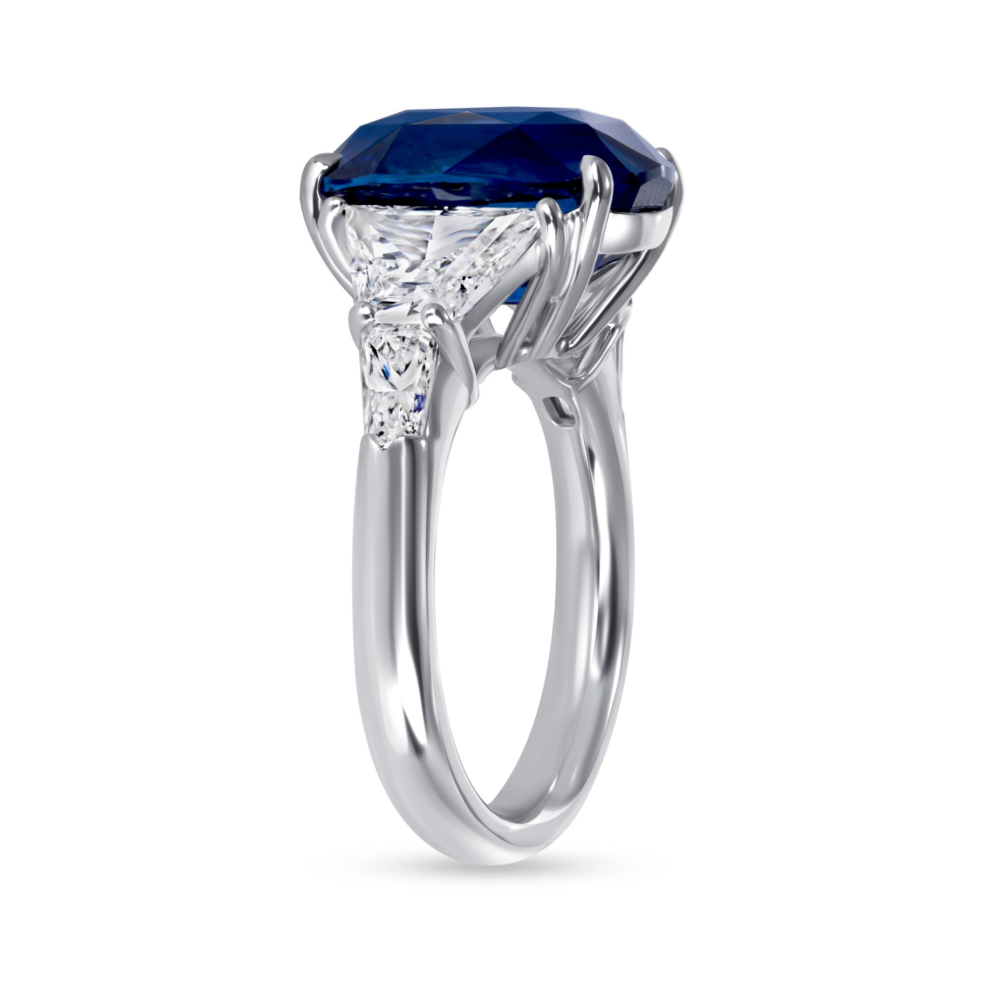 Cushion Cut Blue Sapphire and Trillion Cut Diamond Three Stone Ring in Platinum