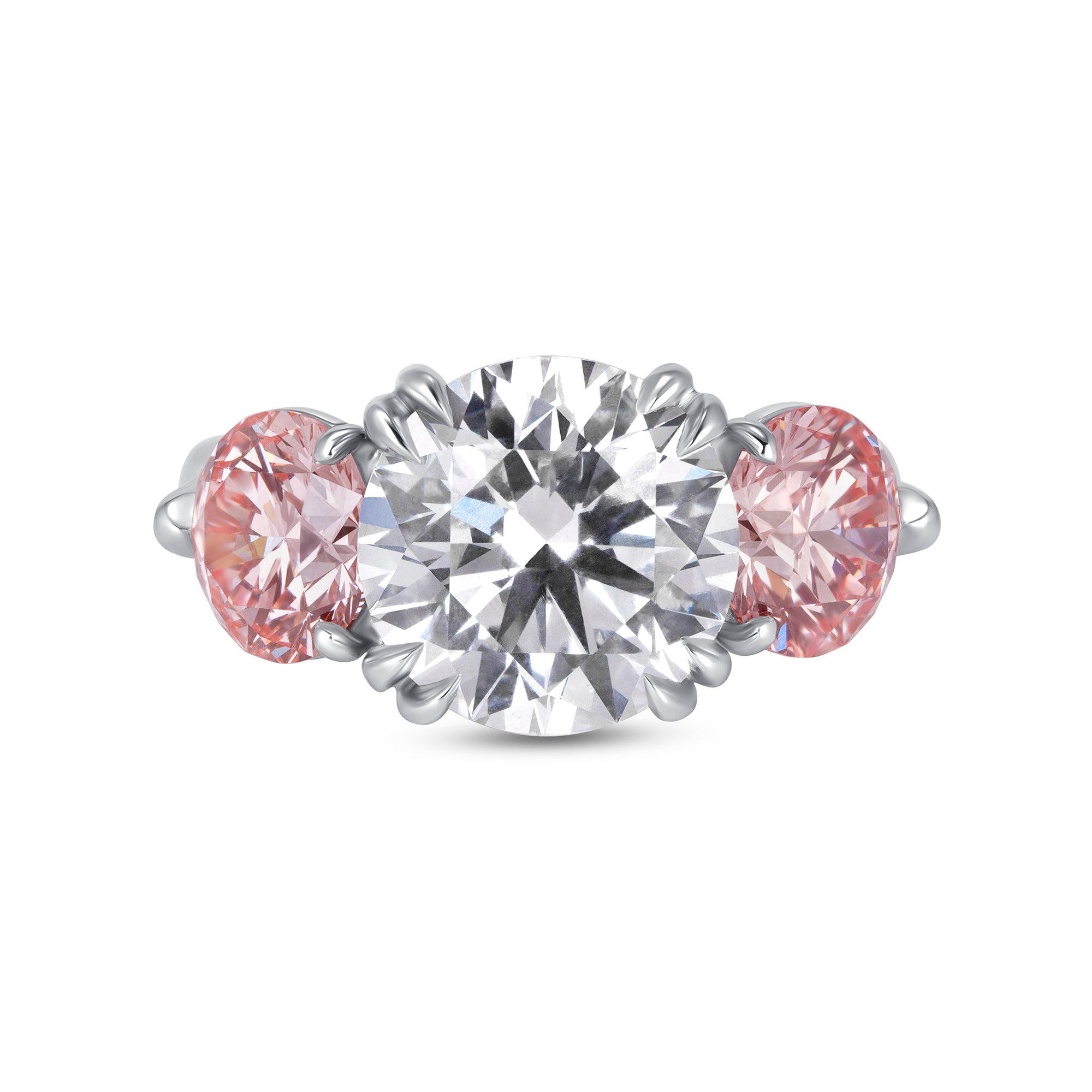 Round Brilliant White and Pink Diamond Three-Stone Ring in Platinum