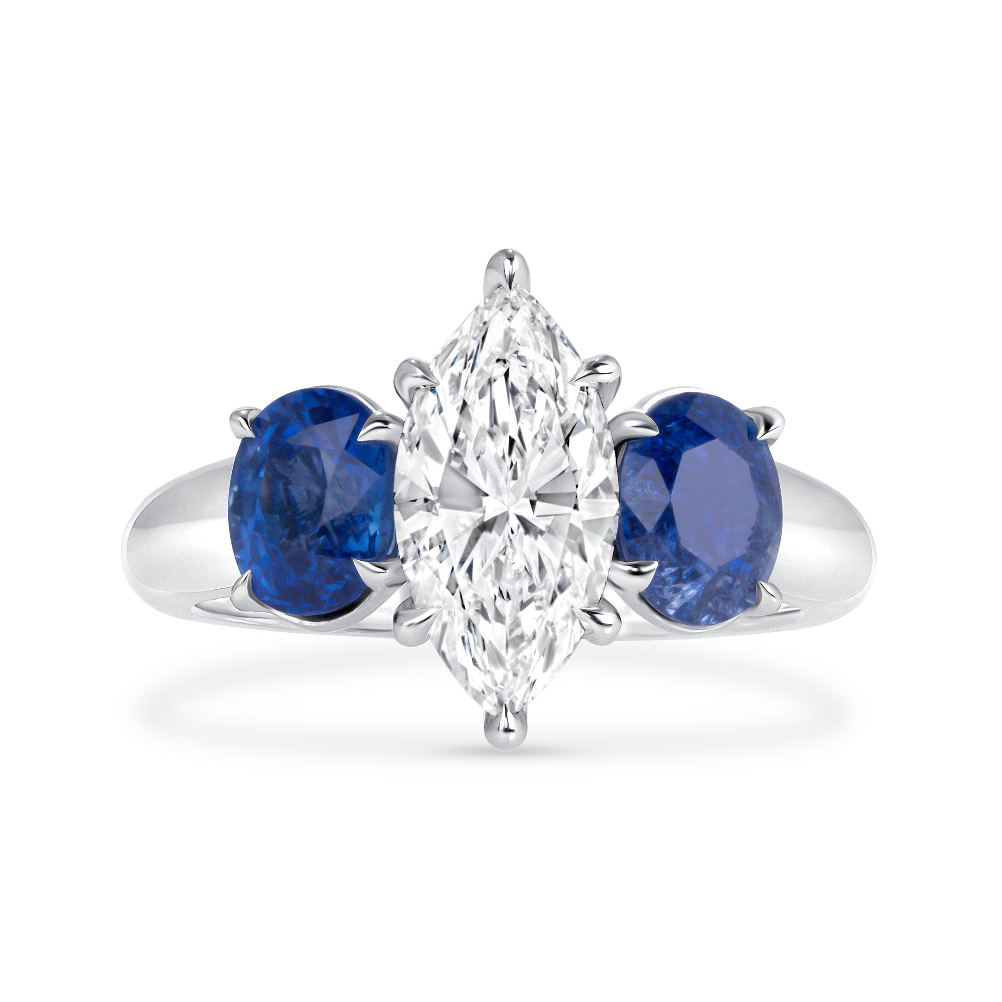 Marquise Cut Diamond and Blue Sapphire Three Stone Ring in Platinum