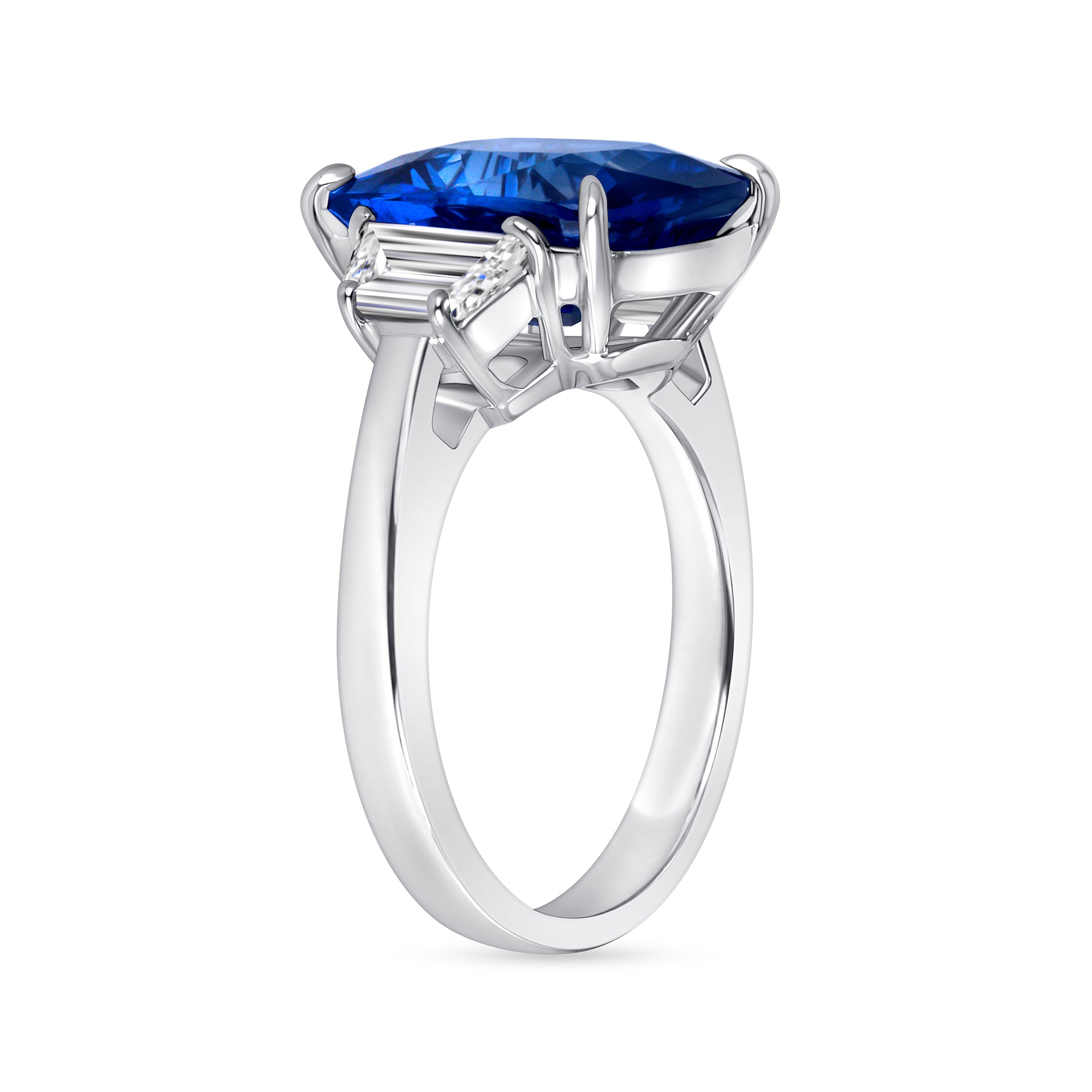 Cushion-Cut Blue Sapphire and Diamond Three-Stone Ring in Platinum
